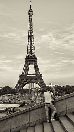 Young lovers at the Eiffel Tower